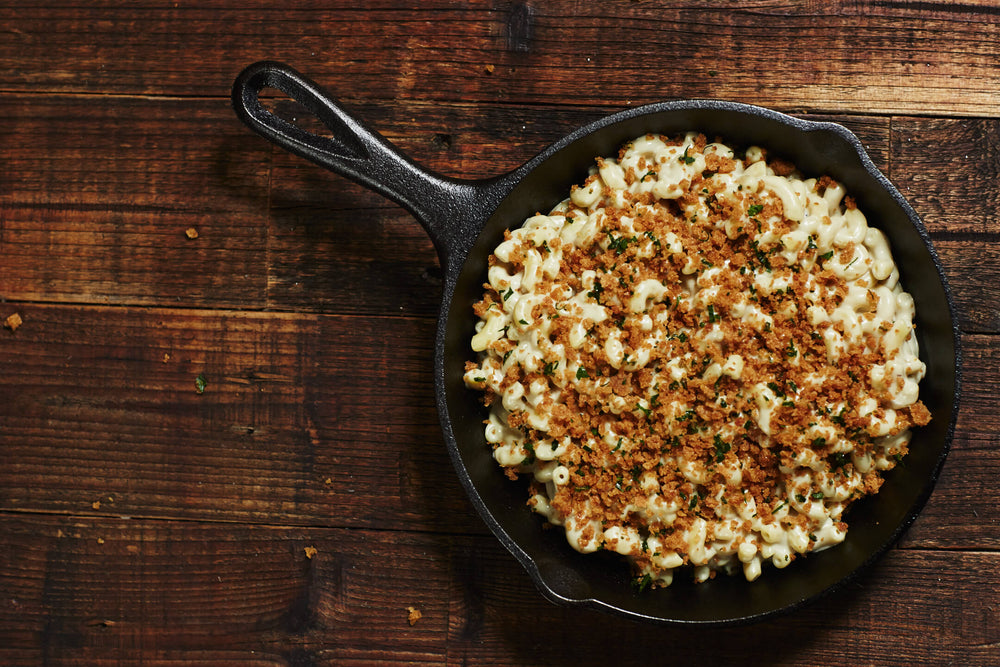 Vegan Mac and Cheese with breadcrumbs in a cast iron skillet