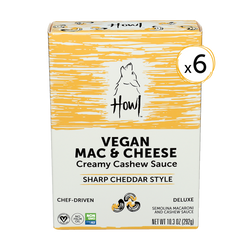 Yellow box of Cashew Based Vegan Mac and Cheese with a sharp cheddar style tang. 6 pack